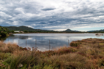 Fototapeta na wymiar Lake near the salt mines Porto-Vecchio of the island of Corsica