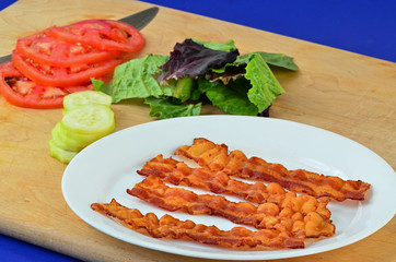 Fried Bacon and BLT Ingredients on cutting board