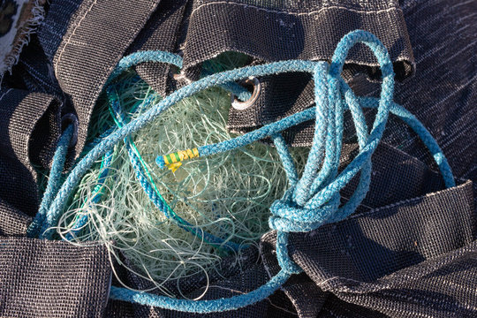 Fishing nets in the port. A network for fishing on the fishing quay.