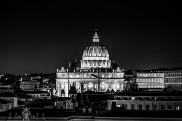 Black and white night view of St. Peter's Basilica in Vatican, Rome, Italy