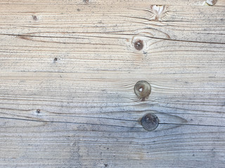 Obraz premium Close-up of a wooden privacy screen with dark splay knots.