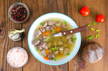Transparent broth with chicken liver