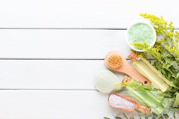 Beauty and fashion concept with spa set on pastel rustic wooden background.