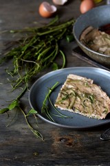 omelet with smilax (sarsaparilla) young shoots in the spring for nutrition. useful food from nature. young shoots are harvested in spring and eaten as asparagus. concept of nutrition from nature.