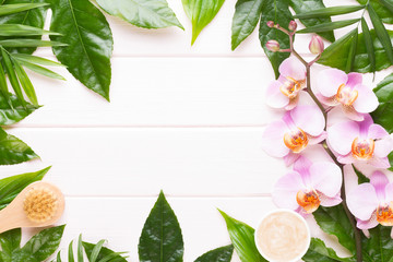 Beauty and fashion concept with spa set on pastel rustic wooden background.