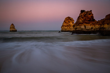 Fototapeta na wymiar Sunset at Praia do Camilo - Algarve - Portugal.