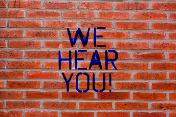 Text sign showing We Hear You. Conceptual photo Listening intently professional counselling expert advice Brick Wall art like Graffiti motivational call written on the wall