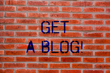 Text sign showing Get A Blog. Conceptual photo Start writing on social networks blogging modern communication Brick Wall art like Graffiti motivational call written on the wall