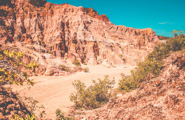 Red cliffs at Coqueirinho's beach in Conde, Paraiba, Brazil