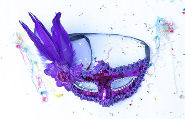 Fototapeta premium Top view Carnival mask on white background.