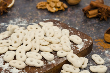 Romanian traditional food called mucenici. Eight shape made from flour, cooked and served with sugar, walnuts and cinnamon