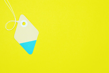 diamond paper tag on yellow background horizontal template