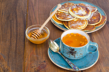 fried pancakes with sugar on plate to Shrovetide