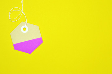 hexagon paper tag on yellow background horizontal template