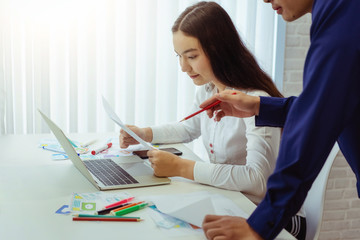 Group designer application discussing for new app mobile in the office. User experience Design concept.