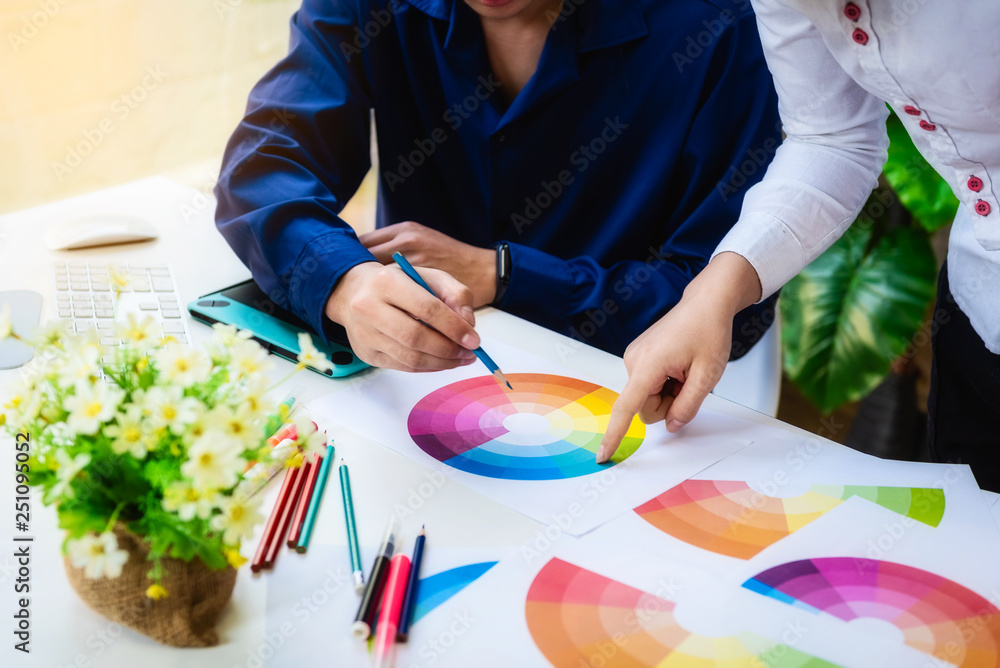 Poster two designer graphic creative people working about select color swatch samples for create new websit