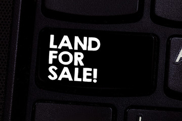 Conceptual hand writing showing Land For Sale. Business photo text Real Estate Lot Selling Developers Realtors Investment Keyboard key Intention to create computer message idea