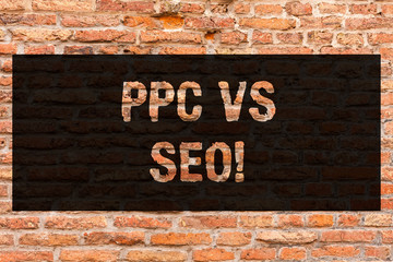 Writing note showing Ppc Vs Seo. Business photo showcasing Pay per click against Search Engine...