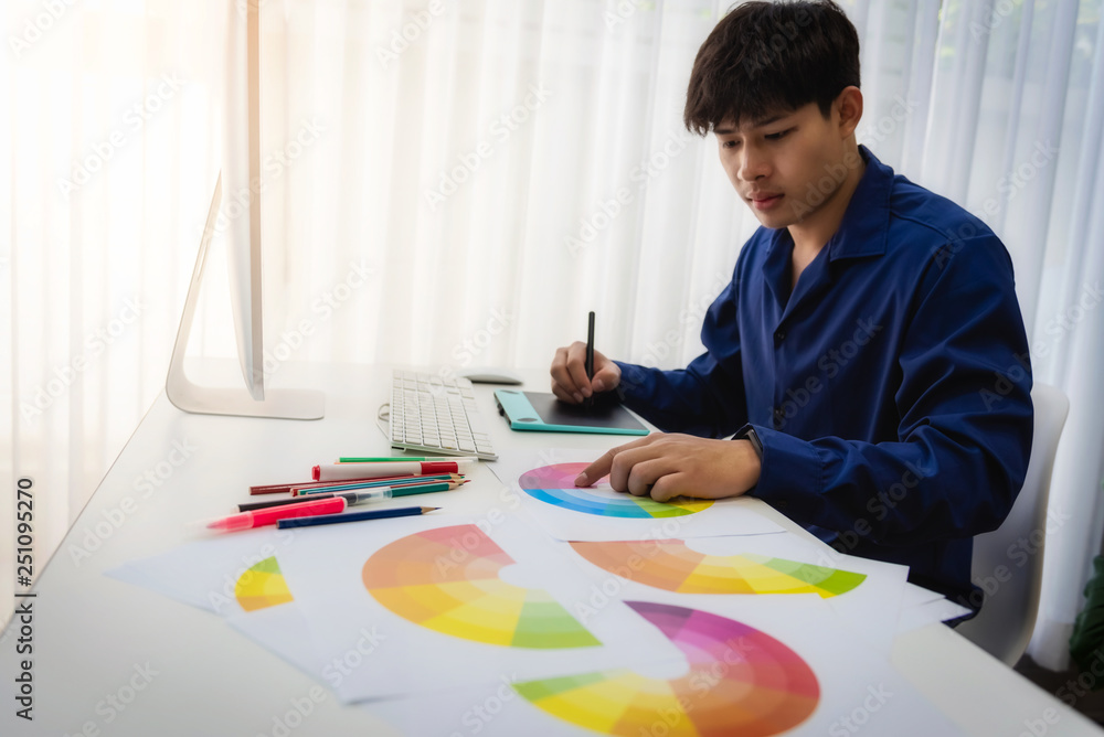 Poster graphic designer man creative using color swatch samples for website layout and application for mobi