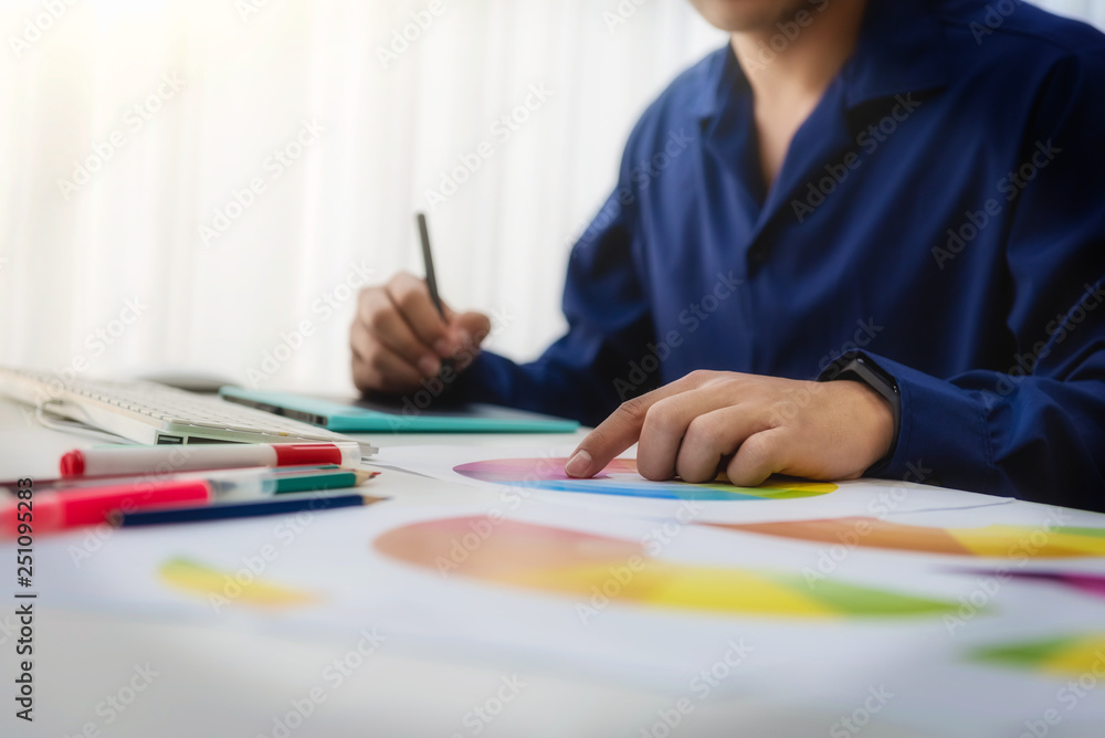 Poster graphic designer man creative using color swatch samples for website layout and application for mobi