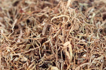 The brown tobacco flakes that grow in Indonesia.