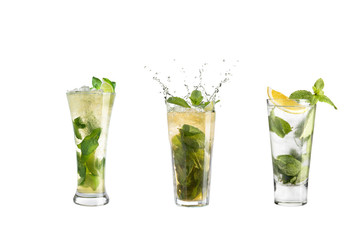Mojito cocktail with mint and lime. Set of mojito in glass goblets on a white background.