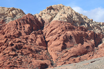 Fototapeta na wymiar Red rock, white top