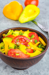 Avocado, sweet paprika, tomatoes, diet salad.