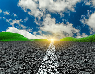 road travel trip asphalt grass clouds blue sky background