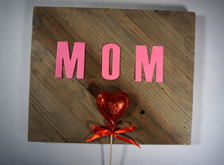 Mother's day design on wood background