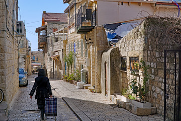 narrow cobblestoned street in old city in Israel © Spiroview Inc.