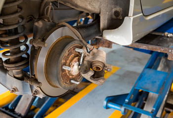 Disc brake of the car during the maintenance at auto service