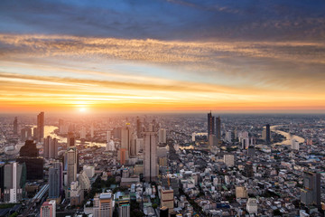 Bangkok city at the beautiful sunset, view from rooftop of Mahanakorn tower, The Tallest building in Thailand.