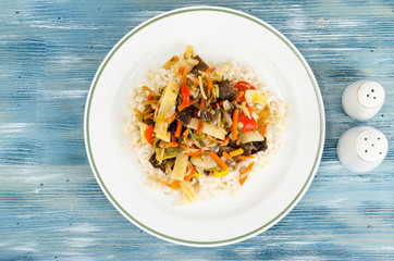 Healthy food without meat, rice with vegetables.