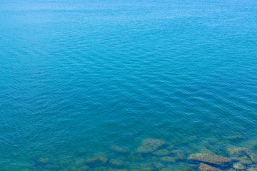 Fototapeta na wymiar wide sea near coastlines, it's so blue and clear. Look peaceful with nothing else
