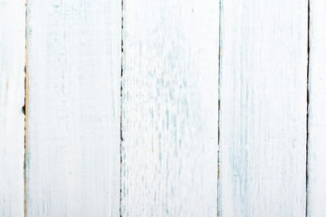 Obraz premium old white shabby wooden table background directly above