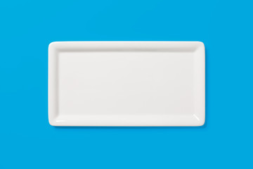 Empty white angular plate on blue background, clipping-path