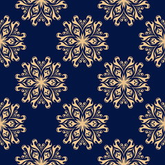 Donkerblauwe naadloze achtergrond met gouden bloemen