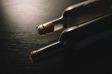 Obraz premium white and red wine in bottles