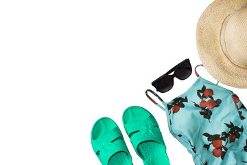 Beach set on white background. Going on a trip. Summer vacation concept. Top view essential travel items.Set of trip stuff. Summer holiday background, Beach accessories- Summer swimsuit and sunglasses