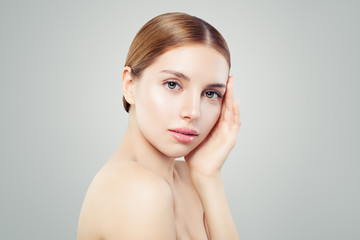 Nice girl on white background. Facial treatment, skincare and cosmetology concept.