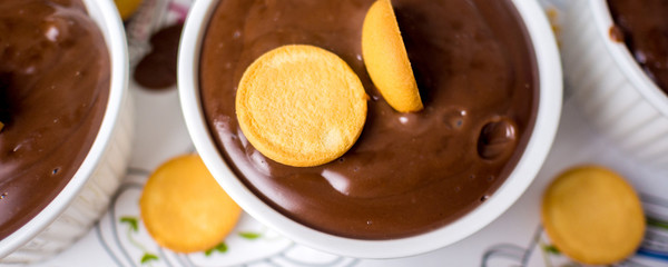 white ceramic bowl with chocolate pudding