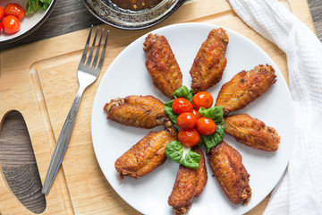 Fried chicken on white plate, top view - Image