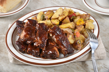 BBQ ribs with roasted potatoes dinner