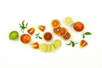 Red blood orange and lime fruits slices set isolated on white background. flat lay. top view. copy space