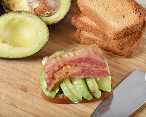 Making a bacon avocado sandwich