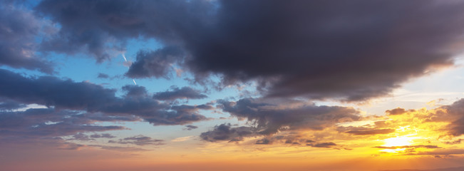 The view of the sky with different states of nature, at dawn and at dusk with dramatic red clouds, sunshine and beautiful sunsets and sunrises.