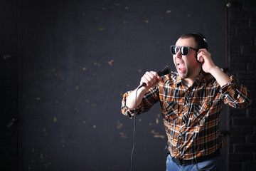 Male architect builder in a protective helmet
