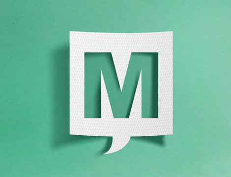 Speech bubble with letter M - Powered by Adobe