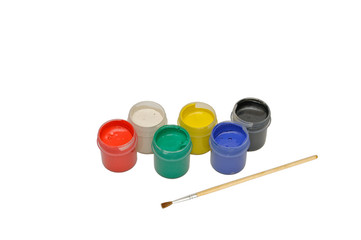 Colored gouache paints and paint brush isolated on white background